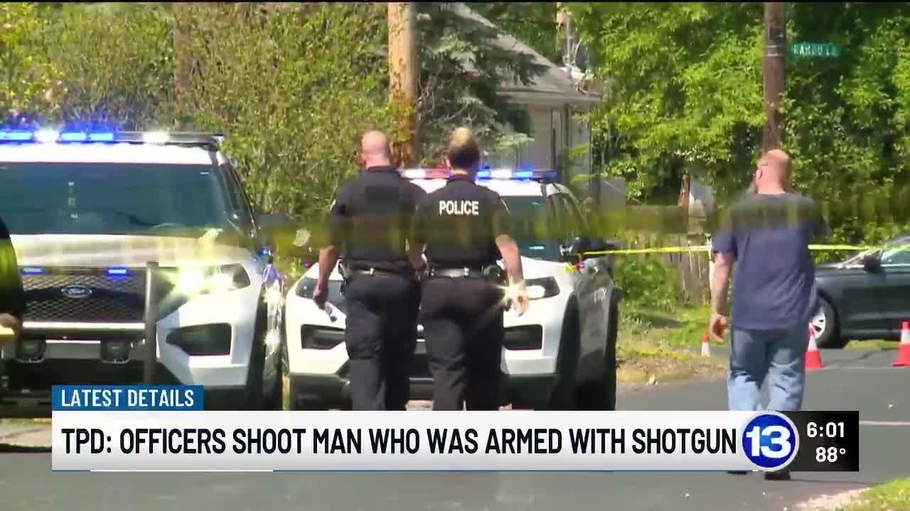 Officers shoot 44-year-old man armed with shotgun, police say