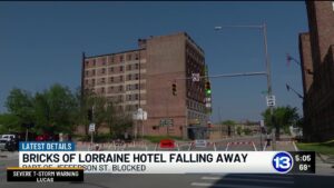 Jefferson St. closed around Hotel Lorraine as brick facade close to toppling