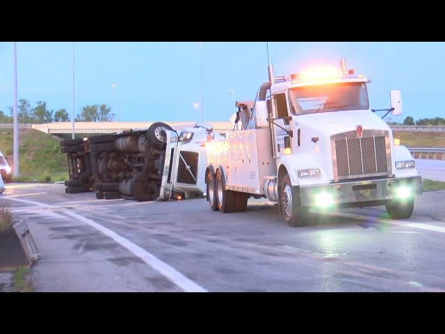 Cleanup continues after semi overturns on I-475 ramp