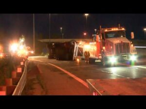 Semi rollover snarls Thursday morning commute
